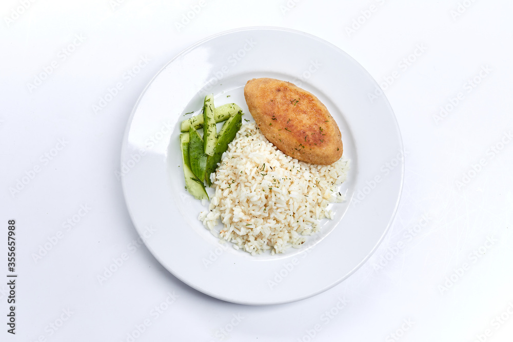 cutlet with rice and cucumber