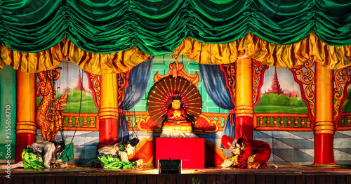 Schilderij op canvas Traditional handicraft puppets are sold in a market at Mandalay, Myanmar
