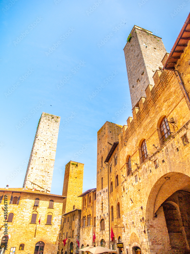 San Gimignano towers. Street view, Tuscany, Italy.