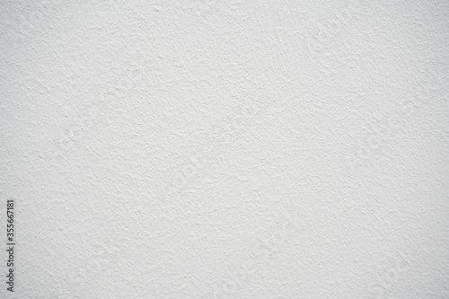 Texture white concrete surface with small pits
