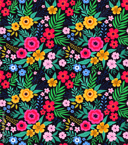 Amazing seamless floral pattern with bright colorful flowers and leaves on a dark background. The elegant the template for fashion prints. Modern floral background. Folk style.