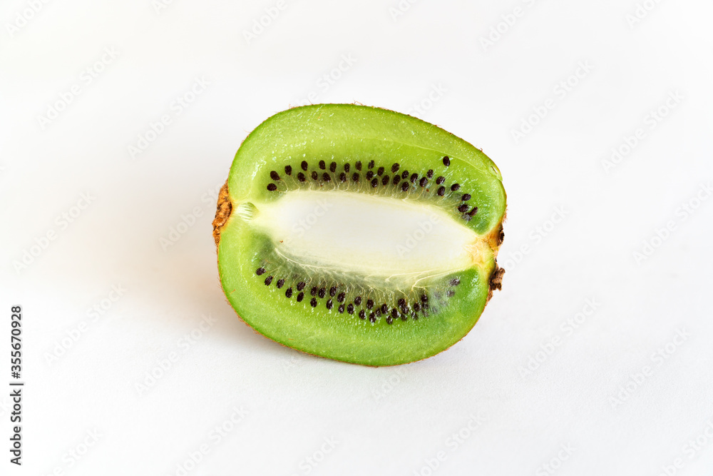 Kiwi slice to length on a white background.