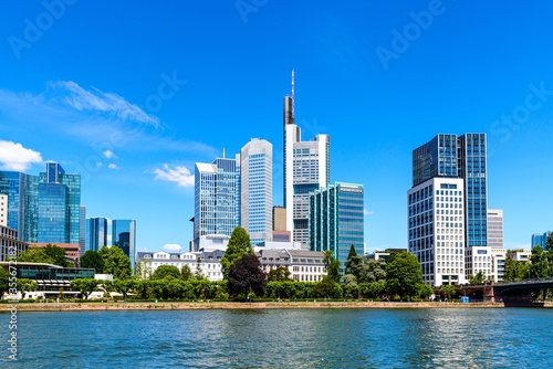 Beautiful view on  Frankfurt am Main skyline cityscape with blue sky  clouds  Main river in spring. Hessen  Hesse  Germany