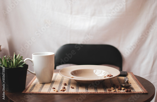 cup of coffee and book on table