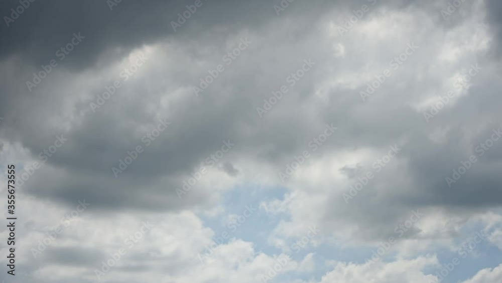 Time lapse motion the clouds are moving fast on the sky in the daytime bright. Time lapse motion the clouds are moving fast on the sky in the daytime bright.