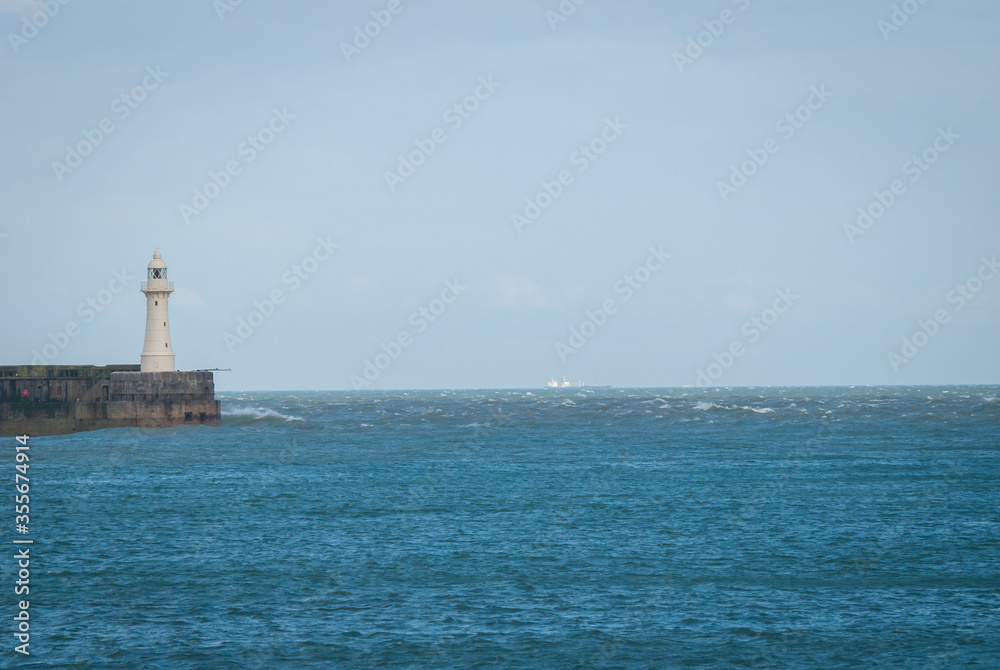 lighthouse at a port entrance