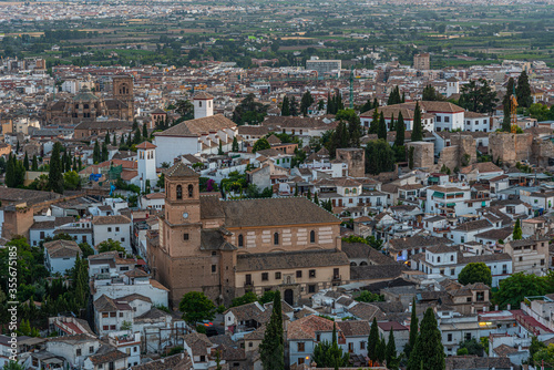 Sunset view of El Salvador church in Granada, Spain photo