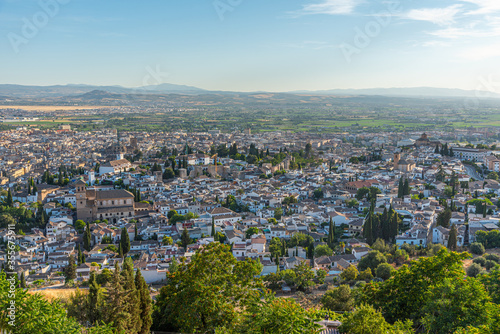 Sunset view over Albaicin neighborhood in Granada, Spain photo