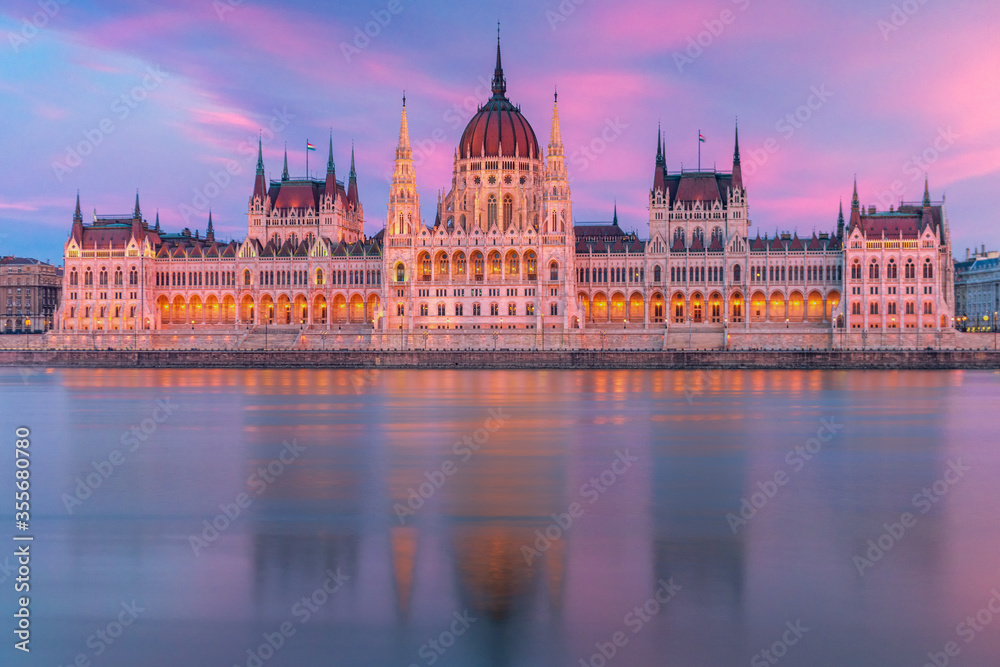 Hungarian Parliament, Budapest with reflection in Danube river during twilight