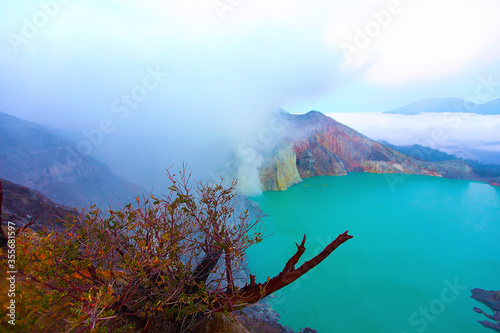 Panoramic view of Kawah Ijen Volcano at Sunrise. The Ijen volcano complex is a group of stratovolcanoes in the Banyuwangi Regency of East Java, Indonesia photo