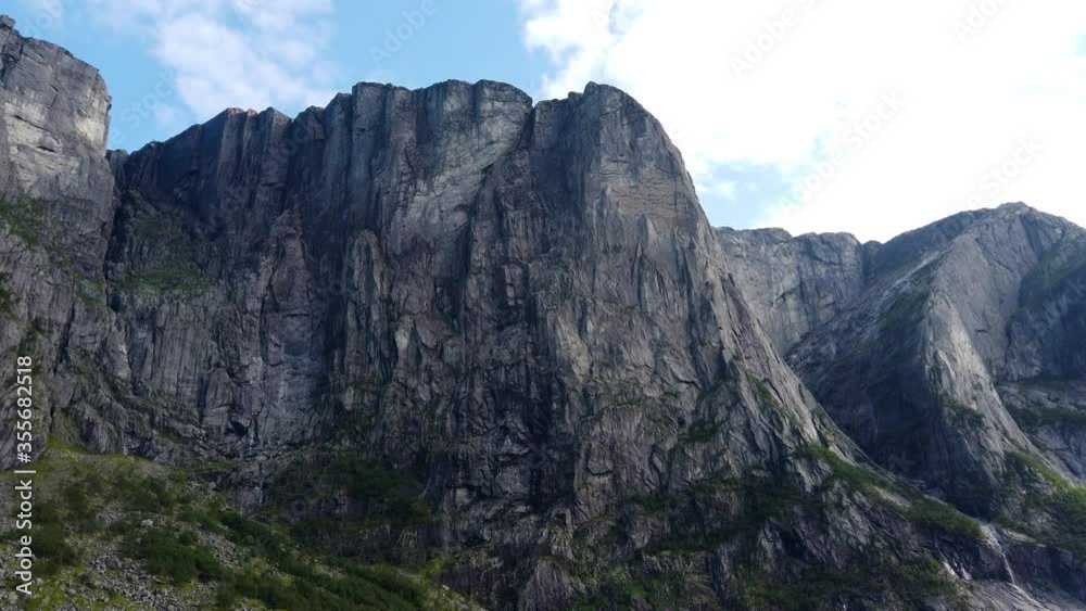 Scenery view of a Rock of Kjerag from above in the Lysefjord of Norway in Summer. Scenery view of a Rock of Kjerag from above in the Lysefjord of Norway in Summer.