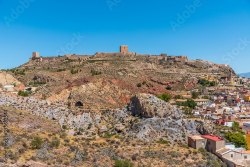 Castle in lorca overlooking the town, Spain photo