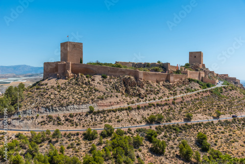 Castle in lorca overlooking the town, Spain photo