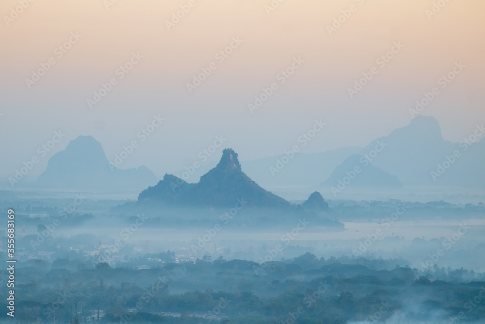 Watercolor view of foggy morning landscape. Hpa An, Myanmar (Burma)