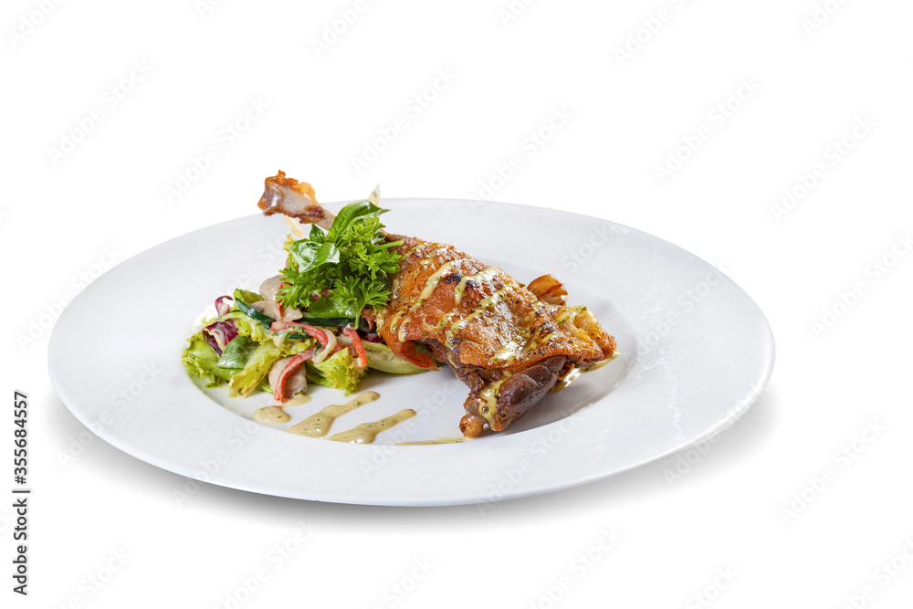 Crispy fried chicken served with salad, parsley, and mushroom mayonnaise sauce, isolated on white. Crispy fried chicken served with salad, parsley, and mushroom mayonnaise sauce, isolated on white.