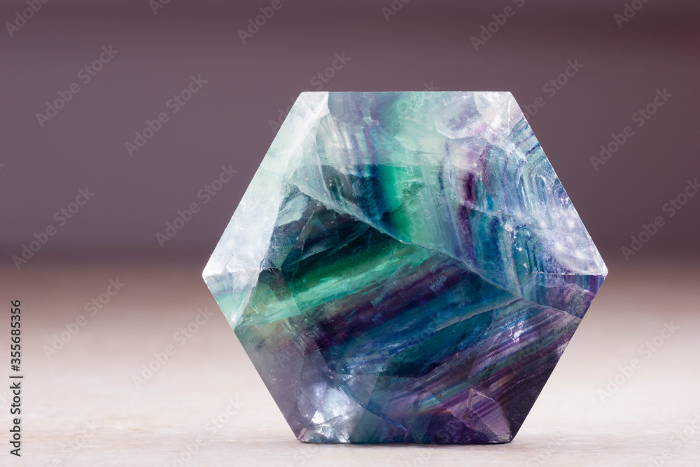 polished flourite crystal in the shape of hexagon
polished flourite crystal in the shape of hexagon