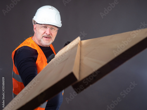 Adult man with wooden board...