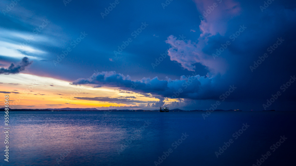 Panorama of sea view during sunrise at Ao Noi Na Beach at Koh Samet island in Thailand. 