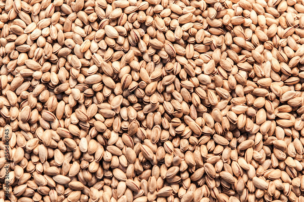 Group of fresh salted pistachios background. Group of fresh salted pistachios background.