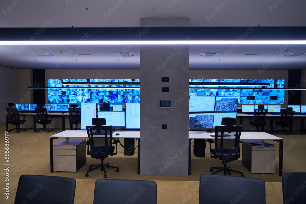 Empty interior of big modern security system control room Empty interior of big modern security system control room