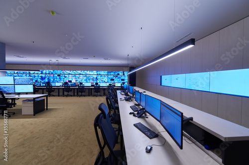 Empty interior of big modern security system control room