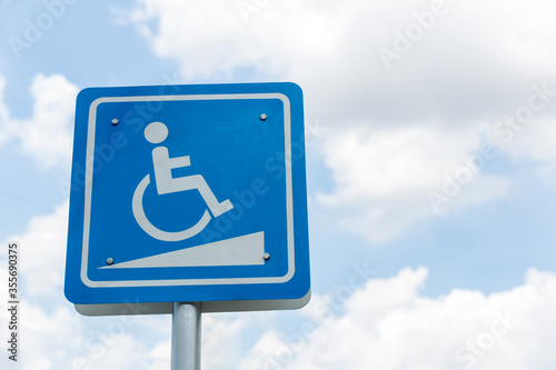 Blue label priority car park for distable person in the oilbank station. symbol of carpark. priority benefits of the special people. image for objects, background, article and copy space.