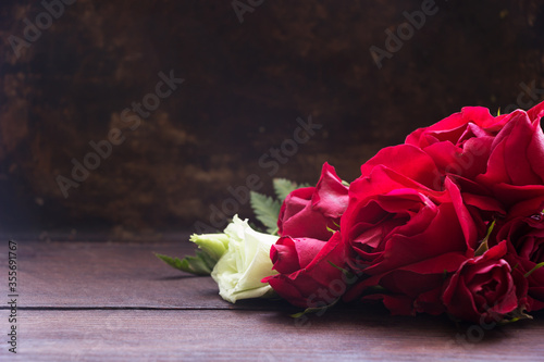 Beautiful red roses , romantic background, card template
