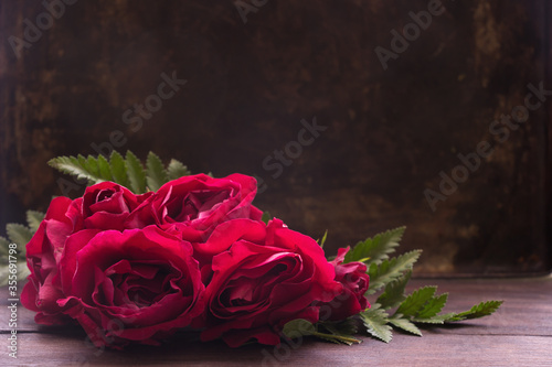Beautiful red roses , romantic background, card template