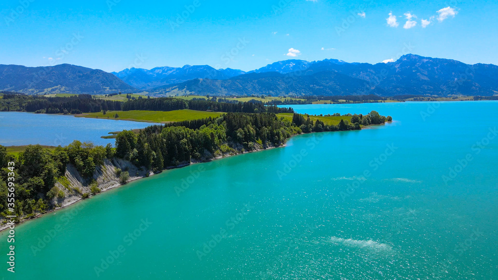 Aerial view over Lake Forggensee at the city of Fuessen in Bavaria Germany