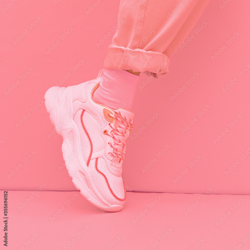 Fashion Sneakers shoes. Minimal monochrome design. Pastel pink