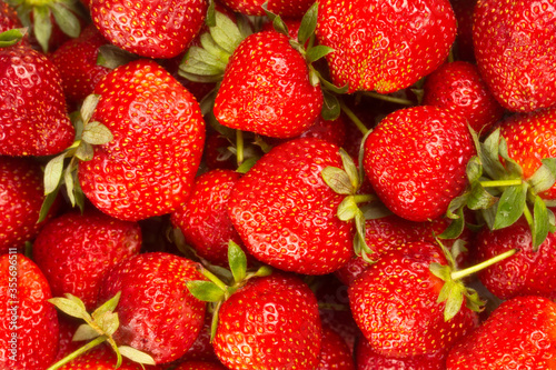 Close-up of fresh ripe strawberries.Berries background.Macro of juicy berries.