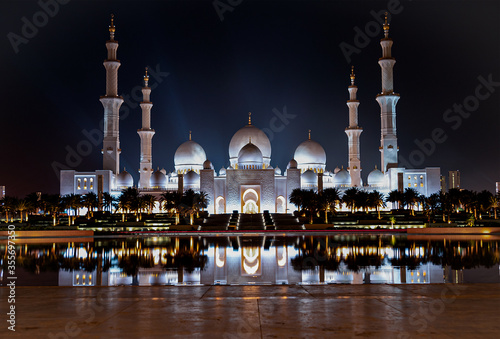 This photo was taken from the dignity oasis of Sheikh Zayed Grand Mosque at night, in a clear atmosphere, with lights from the Great Mosque Square.