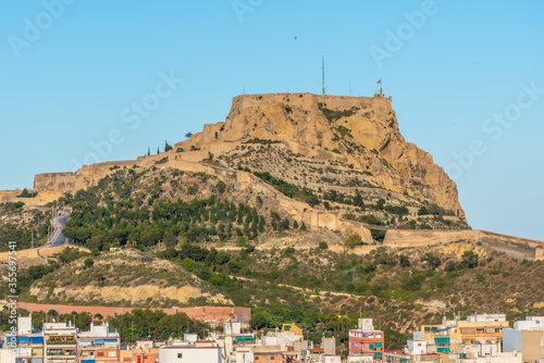 Castle of Santa Barbara overlooking town of Alicante in Spain photo