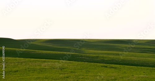 flint hills rolling hills medium shadows at sunset photo