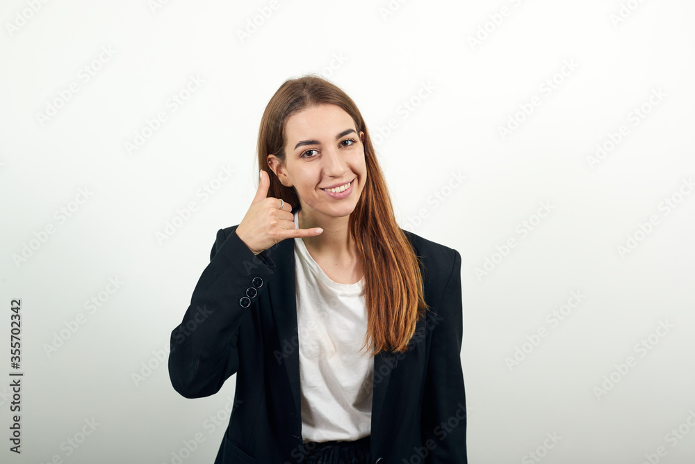 Imitates telephone conversation, keeps hand near ear as if holding mobile phone. Talking on smartphone simulates. Call with her finger. Asks to recall. Pretending that speaking with somebody Imitates telephone conversation, keeps hand near ear as if holding mobile phone. Talking on smartphone simulates. Call with her finger. Asks to recall. Pretending that speaking with somebody