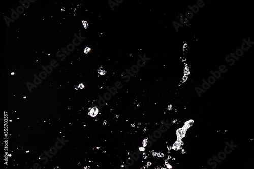 Water splash with bubbles of air on black background. 3d illustration.