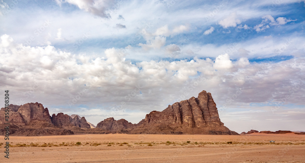 Red sand and rocks in the Wadi Rum desert in Jordan. Red sand and rocks in the Wadi Rum desert in Jordan.