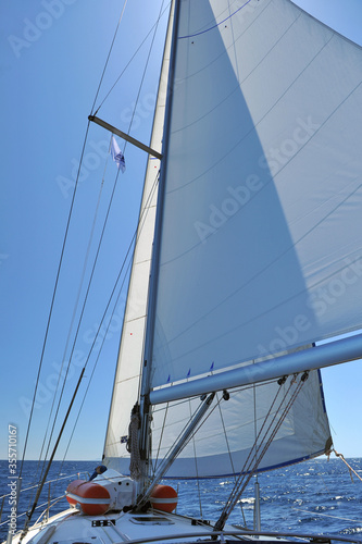 Sailing yacht on the in motion with open sails © Sergey