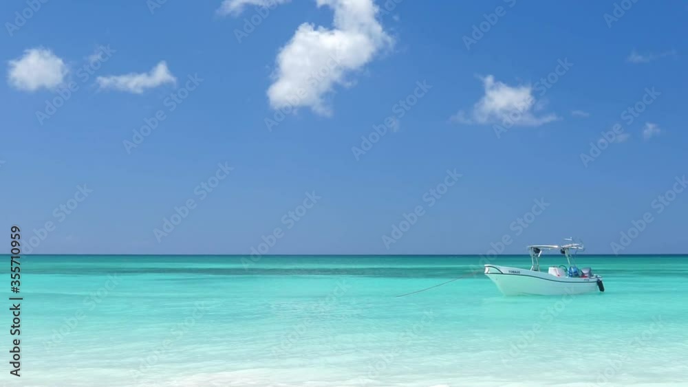 Caribbean sea with boat. Vacation summer holidays. Saona Island. Dominican Republic