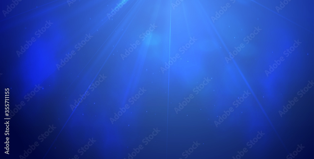 Fototapeta premium Magic Cold Lights on Blue Background Bokeh effect.