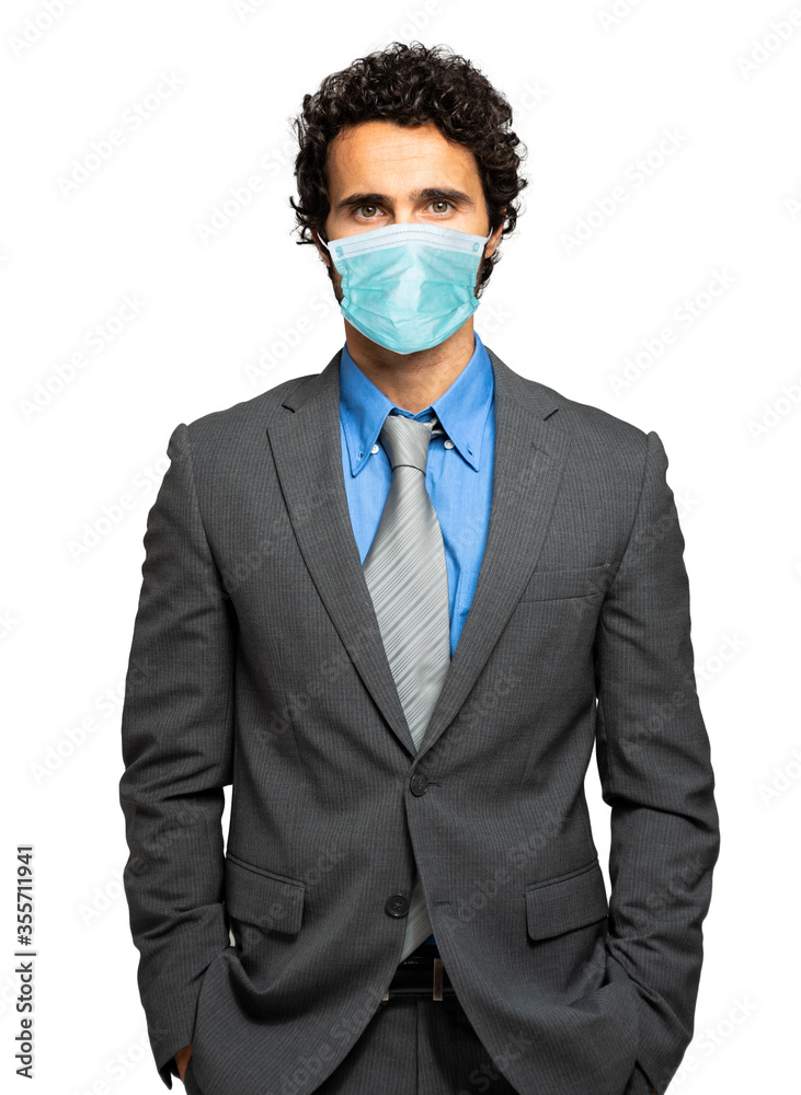 Businessman isolated on white wearing a mask, coronavirus concept Businessman isolated on white wearing a mask, coronavirus concept