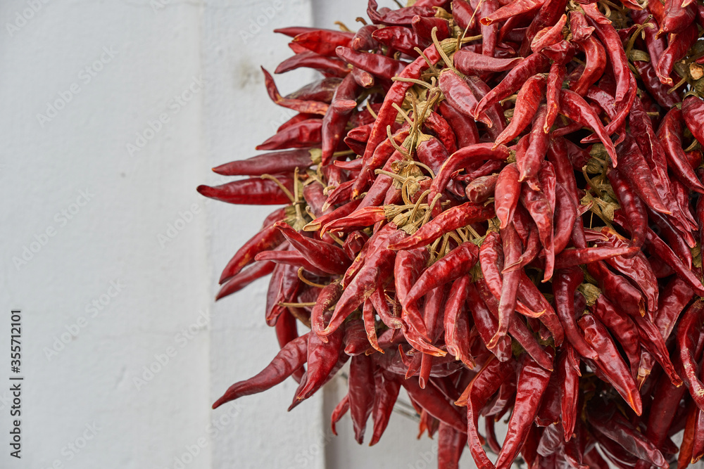 Fototapeta premium Dried hot red pepper om sale in Hungarian street store