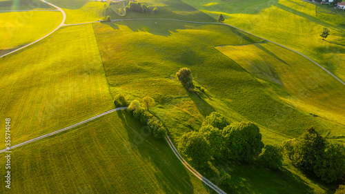 Flight over the beautiful rural landscape of Bavaria Allgau in the German Alps. Aerial view