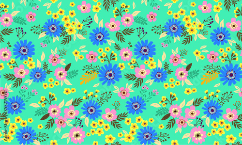 Vector seamless pattern. Cute pattern in small flower. Small multicolored flowers. Light blue background. Ditsy floral background. The elegant the template for fashion prints