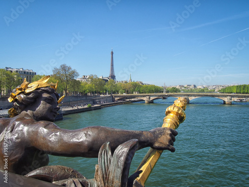Statue on the Pont Alexandre III on Seine river,  Paris, France © Belogorodov