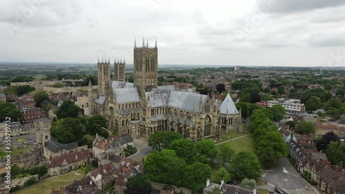 Lincoln Cathedral, Lincoln, England, UK.
Aerial view of the historic and world famous Lincoln Cathedral on a cloudy day. A hugely popular tourist attraction. Film location of The Da Vince Code photo