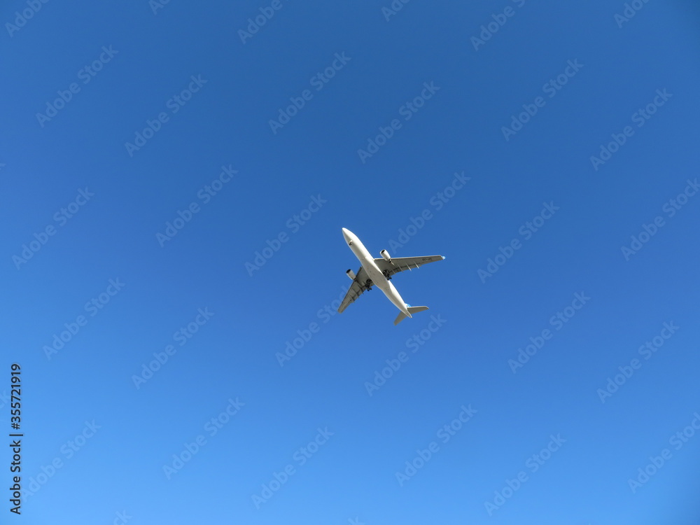 Beautiful photo of a plane landing at the airport taking land Beautiful photo of a plane landing at the airport taking land