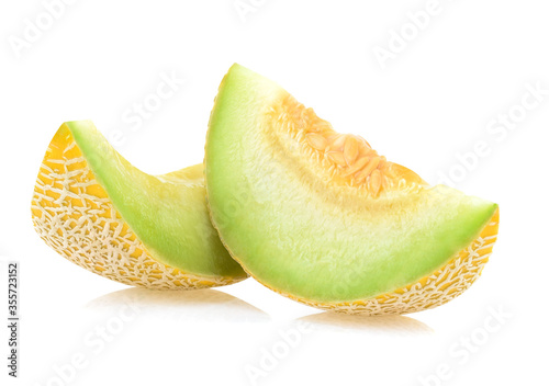 Cantaloupe melon ripe with slices isolated on white background.