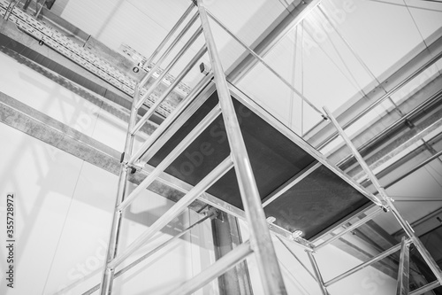 New Aluminium Scaffolding Assembled Inside Commercial Warehouse