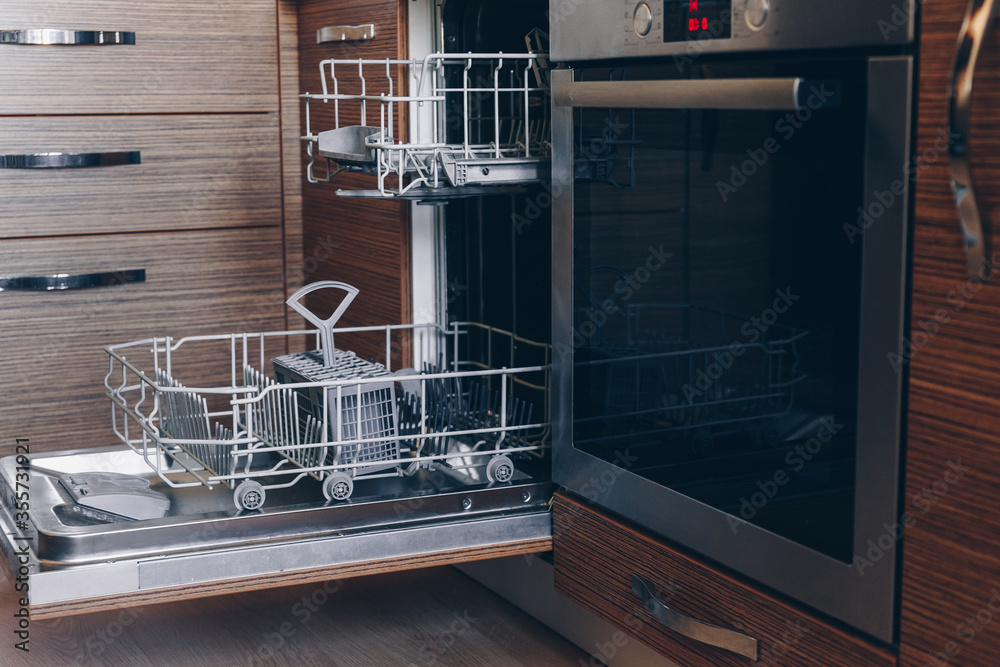 Elements of the kitchen. A technique that makes life easier. Dishwasher, oven, kitchen Elements of the kitchen. A technique that makes life easier. Dishwasher, oven, kitchen